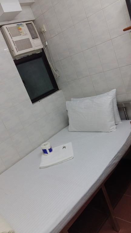 New Yan Yan Guest House Reception 9Th Floor Flat E4 E6 Hong Kong Exterior photo